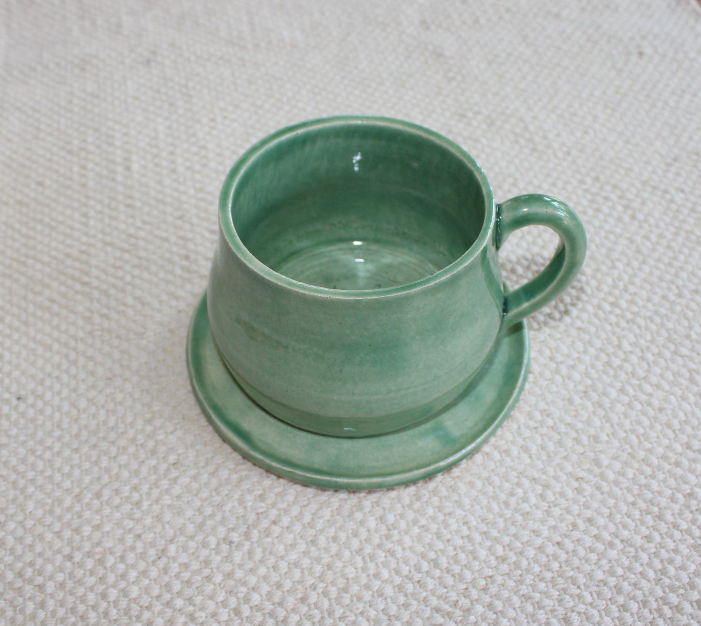 Green cup with saucer