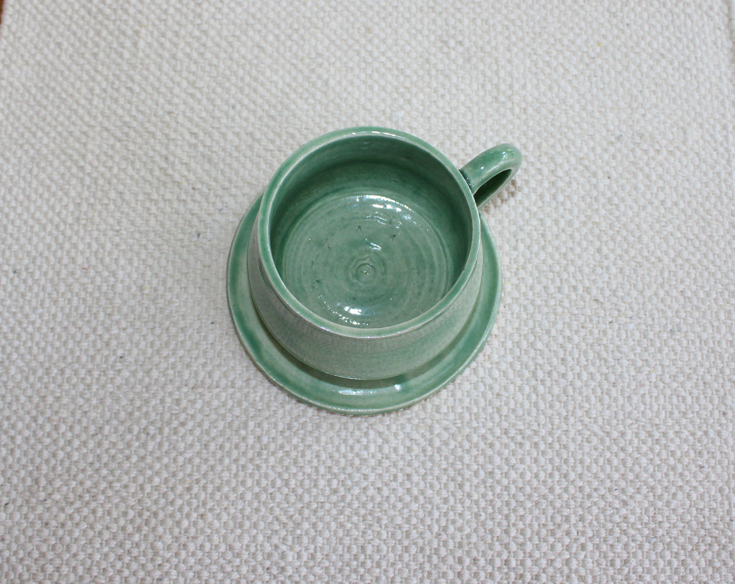 Green cup with saucer