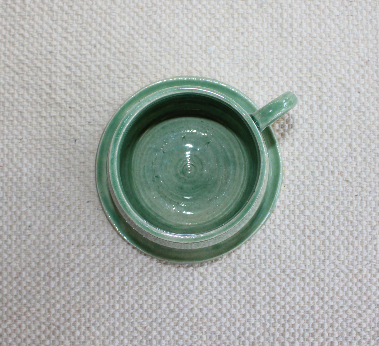 Green cup with saucer